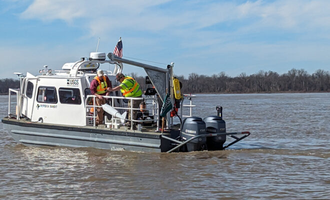 A photo of USGS vessel "Hypoxia Bandit" on the Mississippi River in Vicksburg in early 2024. USGS scientists are using a US-D-96 sampler to collect sediment and water-quality samples from the river. (Image credit: USGS Lower Mississippi Gulf Water Science Center)